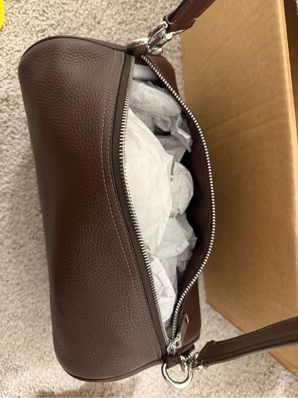 Coach large leather barrel bag with crossbody strap included